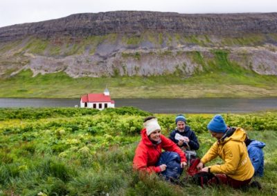 Students eating a picnic outdoors in Iceland