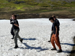 students hiking on snow