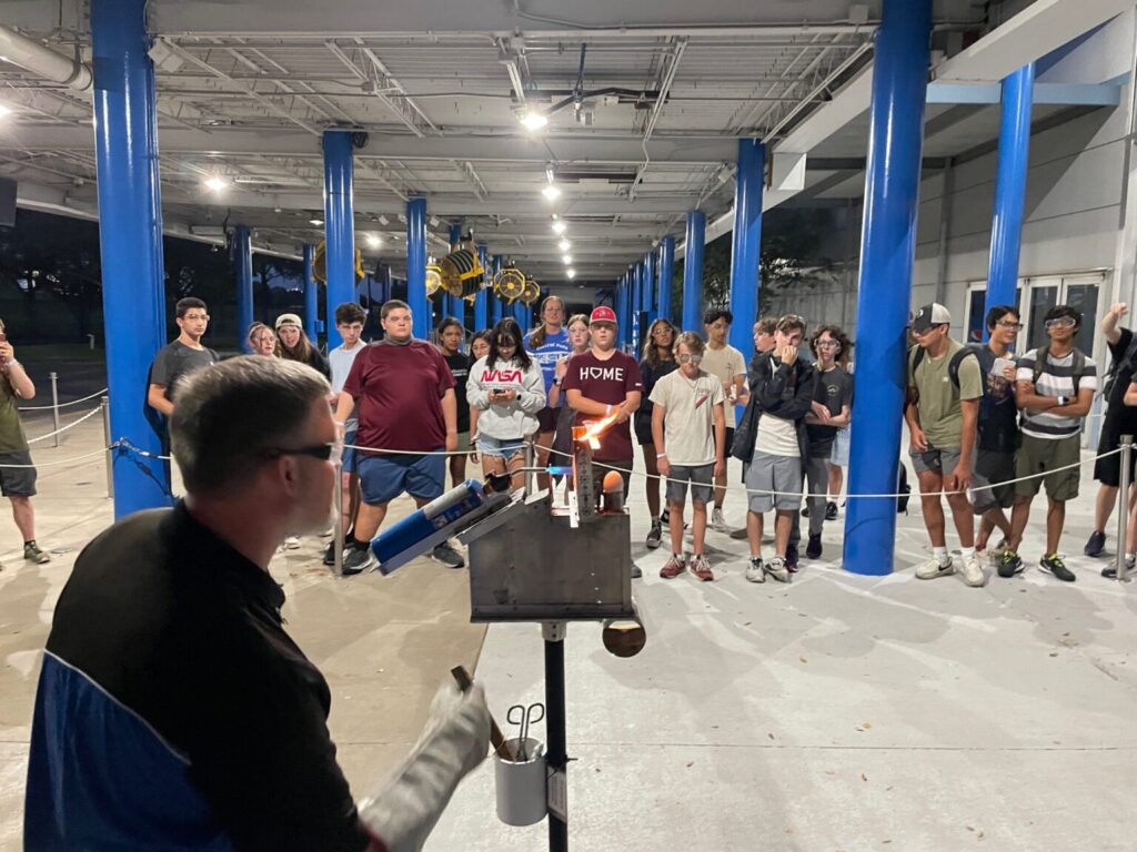 Students watching demonstration of thermal protection.